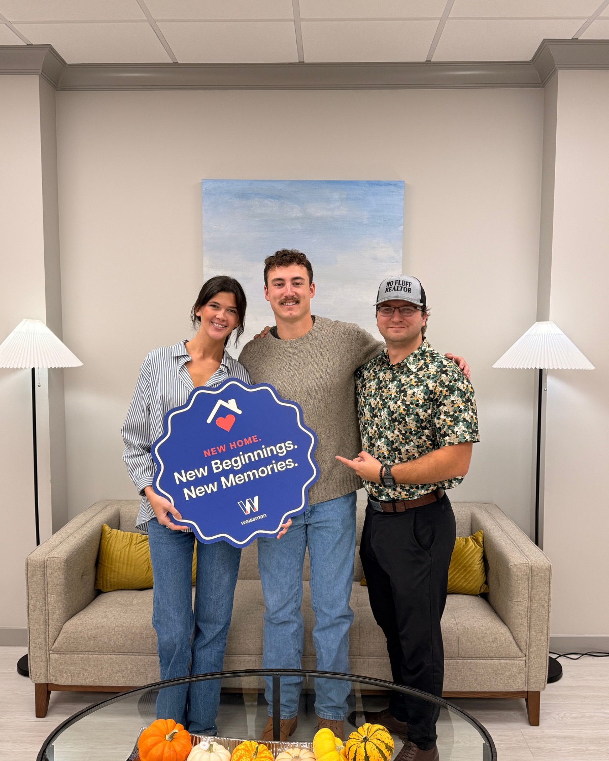 Lazaro Cocho celebrating a closing with happy new homeowners in Savannah